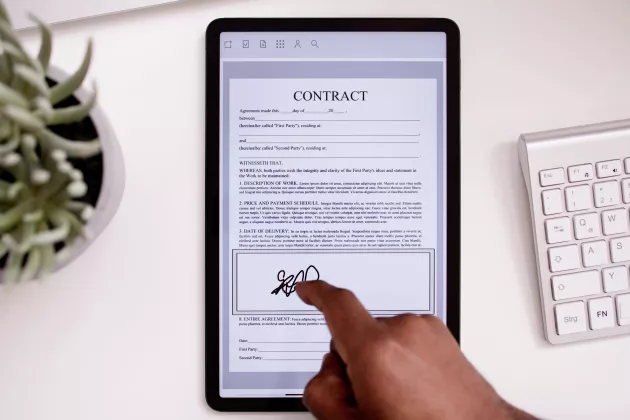 Digital signature on contract.